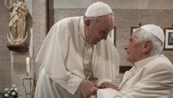 Pope Francis laughs together with the late Pope Emeritus Benedict XVI on 28 November 2020