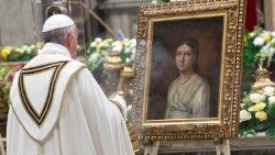 Pope Francis contemplates a painting of Pauline Jaricot