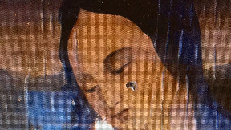 Von Schüssen beschädigtes Marienbild in einer Bagdader Kirche