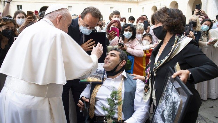 Pope Francis blesses Michael Haddad at Wednesday's General Audience