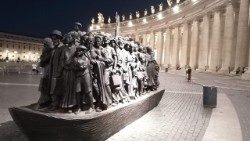 A monument to migrants and refugees stands in St. Peter's Square