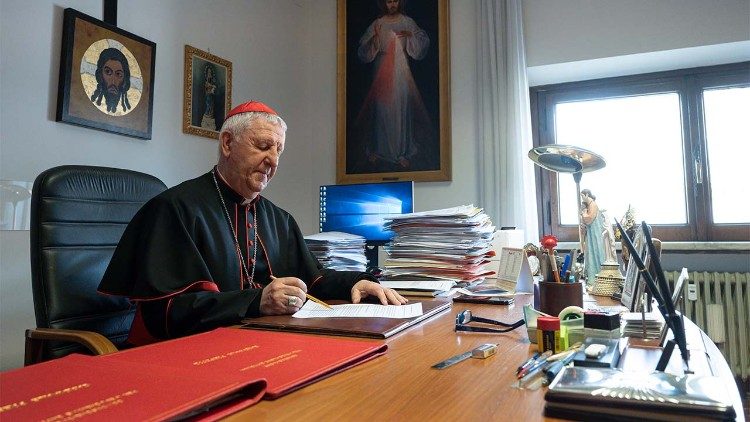 Cardinal Versaldi at his desk at the Congregation for Catholic Education