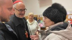 Cardinal Michael Czerny meeting Ukrainian refugees during recent visi to Hungary