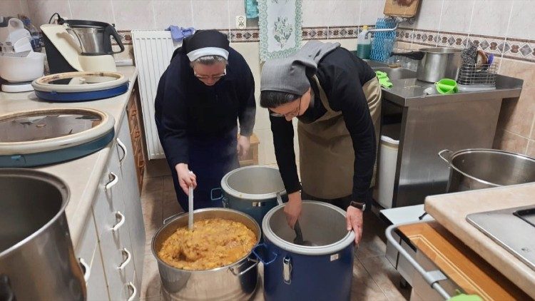 Nuns in the western city of Yavoriv prepare a meal for Ukrainian refugees