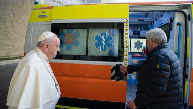 Pope Francis and Cardinal Krajewski inspect the ambulance in the Vatican 