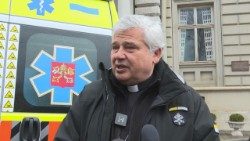 Cardinal Krajewski delivering the first ambulance donated by Pope Francis to help Ukrainian children in Lviv