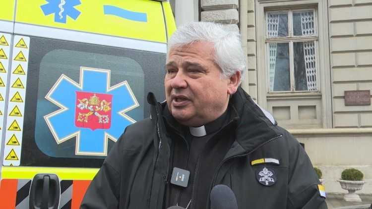 Cardinal Konrad Krajewski delivering the Pope's ambulance in Lviv