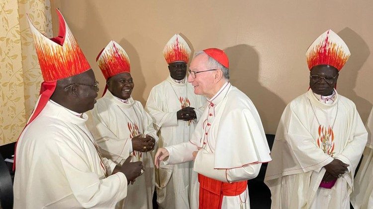Cardinal Parolin with several Bishops