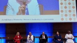 Panelists speak during the Caritas conference at UNESCO in Paris