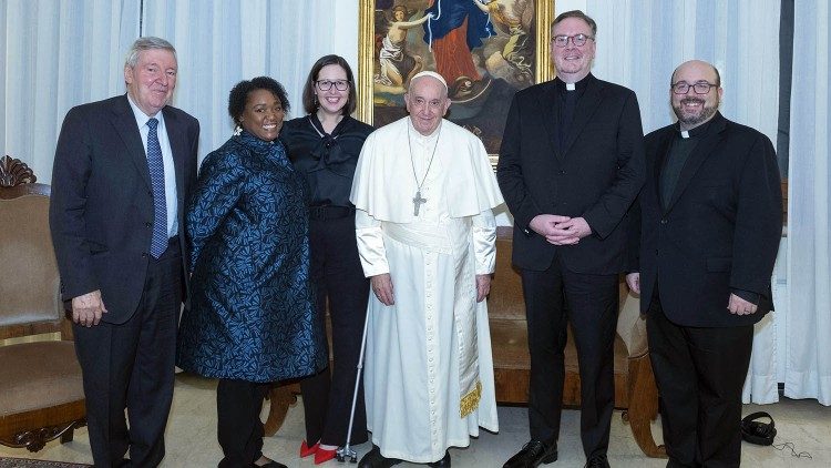 Pope Francis and some of the America Magazine staff at Casa Santa Marta