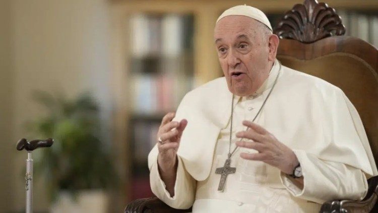 Pope Francis gestures during his interview with AP