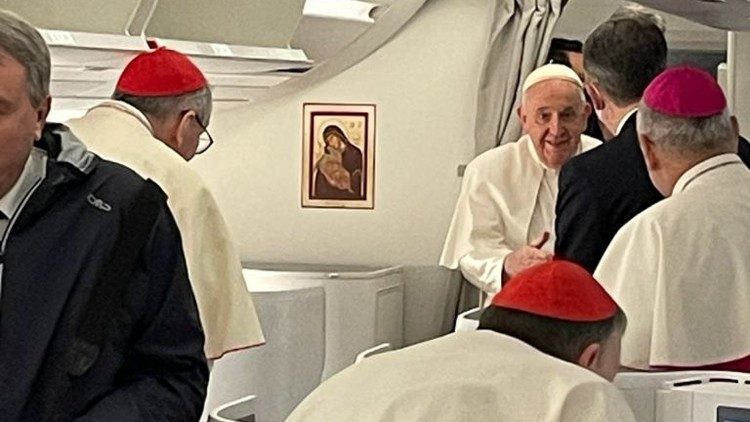 Pope Francis aboard the papal flight