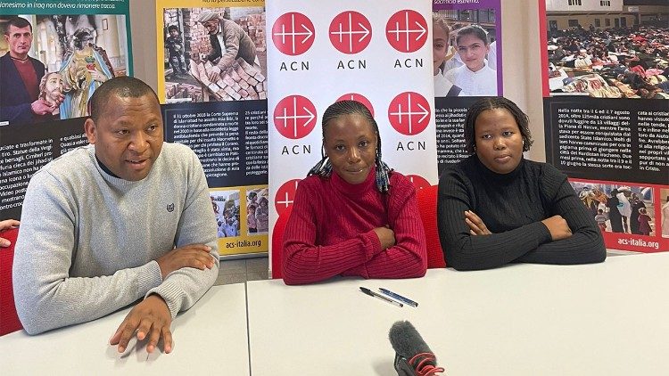 The two girls and Fr Joseph meeting with journalists at ACN, Rome