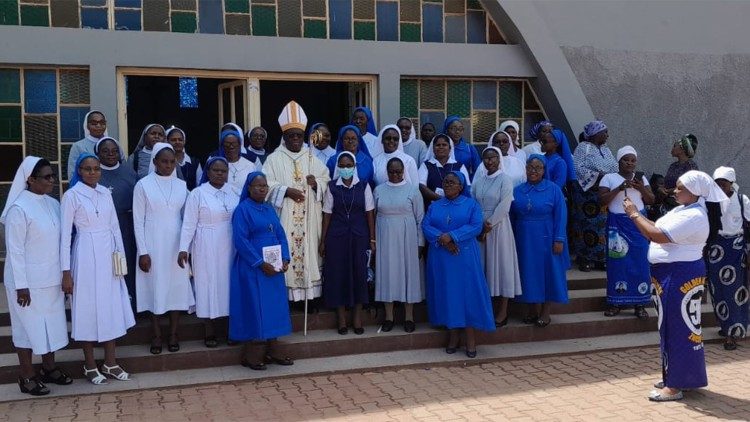 After Mass some of the religious take a picture with Bishop Kasonde. 