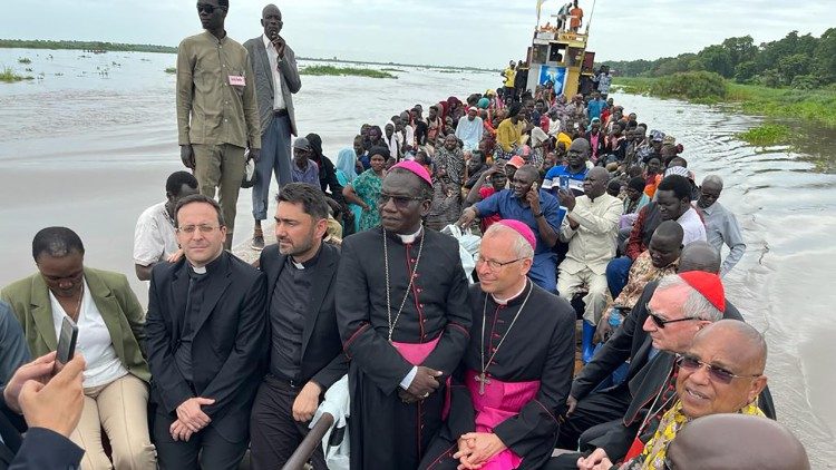 Cardinal Parolin on the boat that carries Sudanese refugees to Malakal