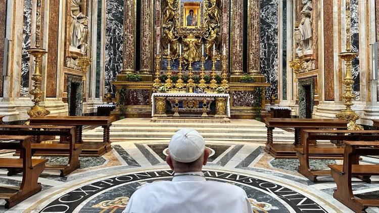 Pope Francis prays before Our Lady's icon on Tuesday