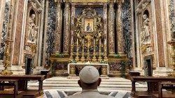 Pope Francis prays at the feet of Our Lady's icon