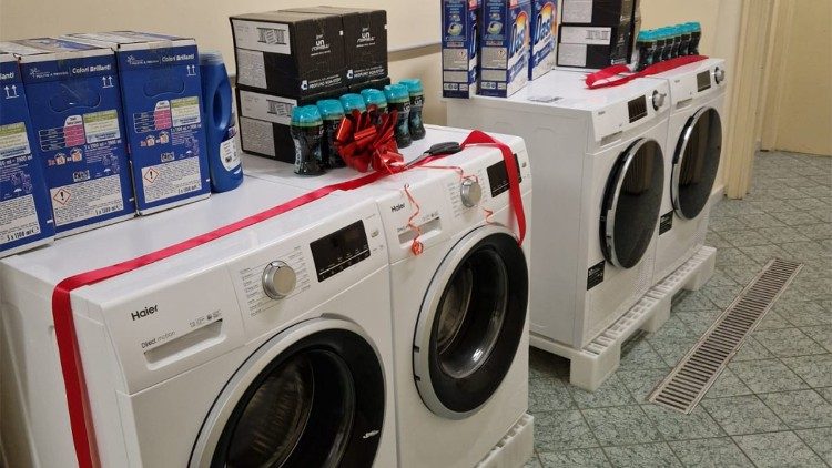 One room in one of the "Pope Francis laundromats"