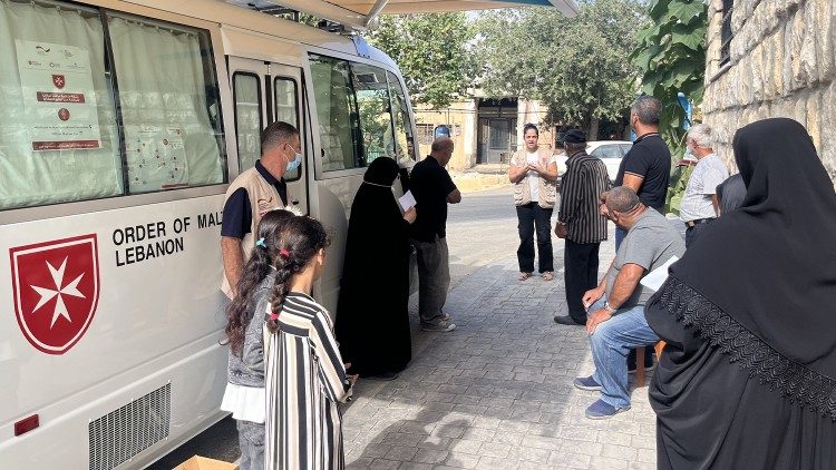 An Order of Malta mobile clinic assists people in need
