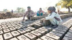 Children working in a brick factory in Pakistan