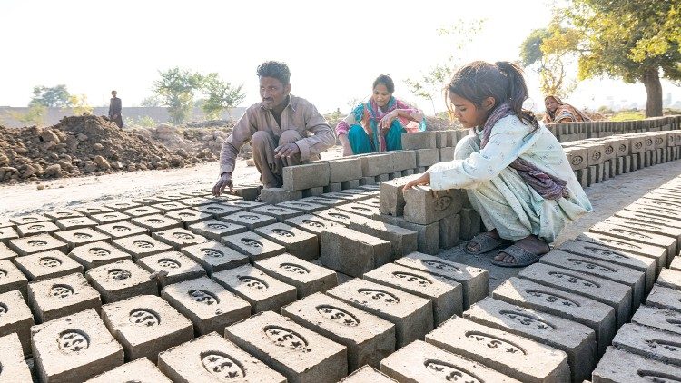 Children working in a brick factory in Pakistan