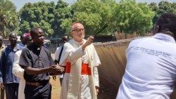 Cardinal Czerny blesses a boat for refugees and migrants in South Sudan