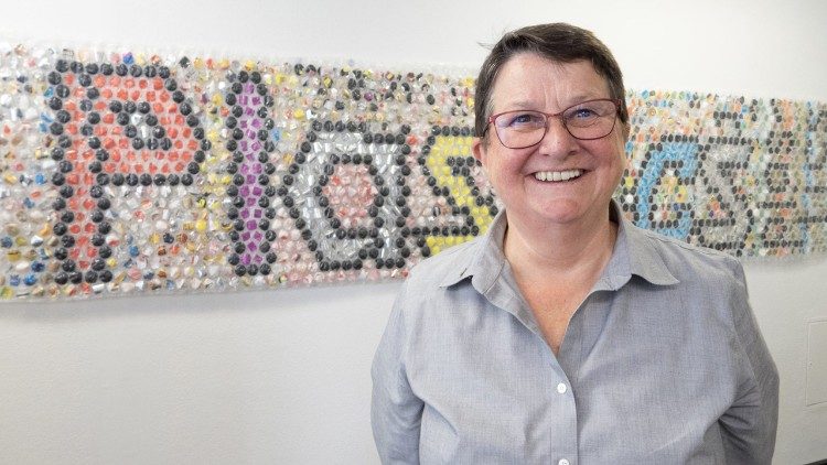 Sister Mary-Ann Casanova with her PLASTICS art installation made using plastics