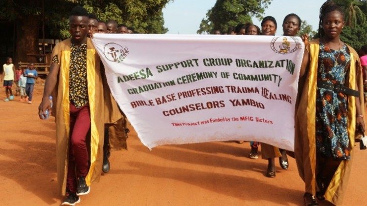 The first graduates of the Bible Based Trauma Healing Counselling march from ASGO office to St. Mary Catholic Parish in June 2022