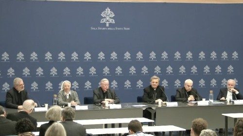 Cardinals Hollerich (centre L) and Grech (centre R) at the Holy See Press Office